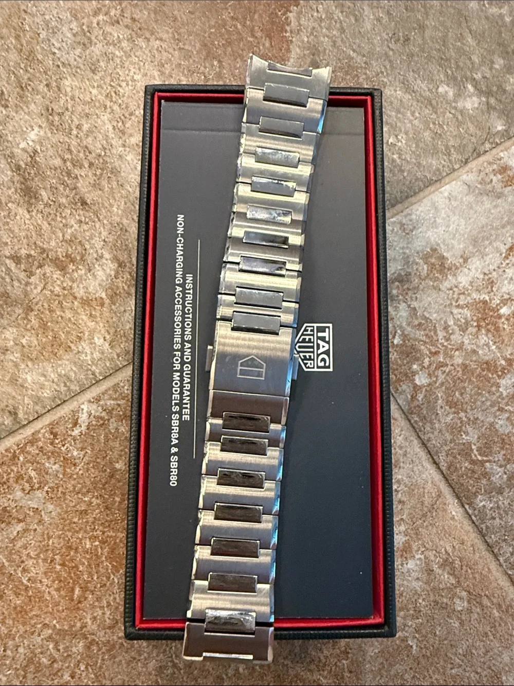 Tag Heuer Smartwatch with Black Silicone Band and Silver Case
